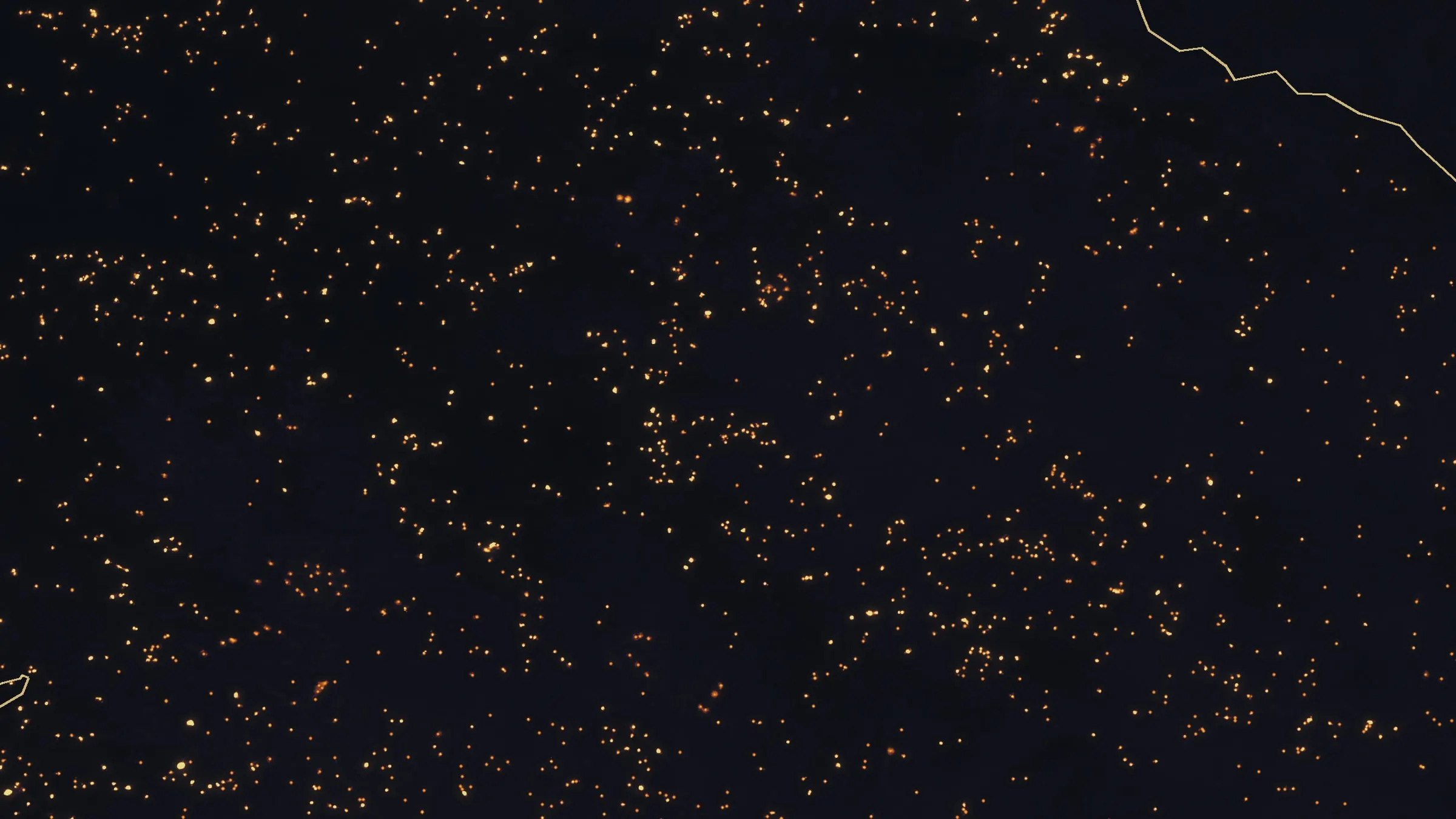 Night infrared of the Fielder Mountain fire on its first night, more than a thousand separate heat sources glowing across dark burned ground.